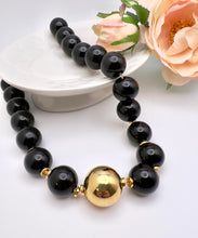 Load image into Gallery viewer, Ball resin necklace golden ball detail Seductive Collection
