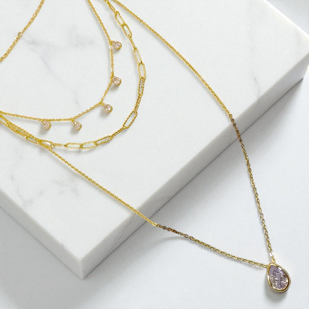 Three layer necklace with drop-shaped pendants