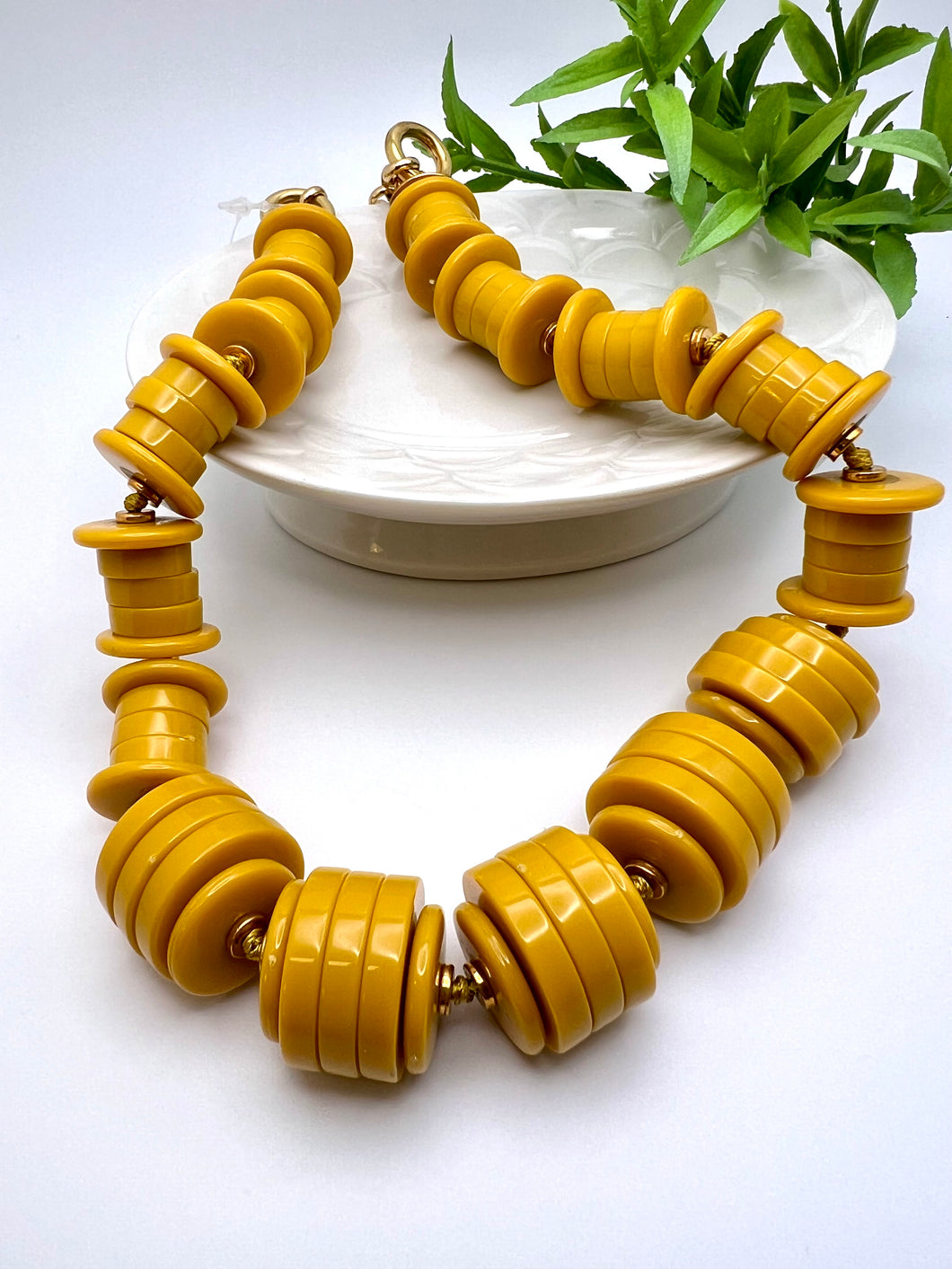 Exclusive organic necklace of growing tubes