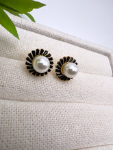 Load image into Gallery viewer, Pearl earrings surrounded by color baguettes
