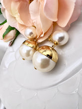 Load image into Gallery viewer, Pearl with open gold shell earrings
