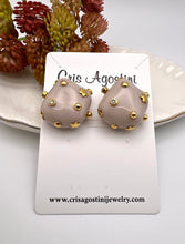 Load image into Gallery viewer, Organic resin with gold details on earrings
