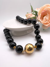 Load image into Gallery viewer, Ball resin necklace golden ball detail Seductive Collection
