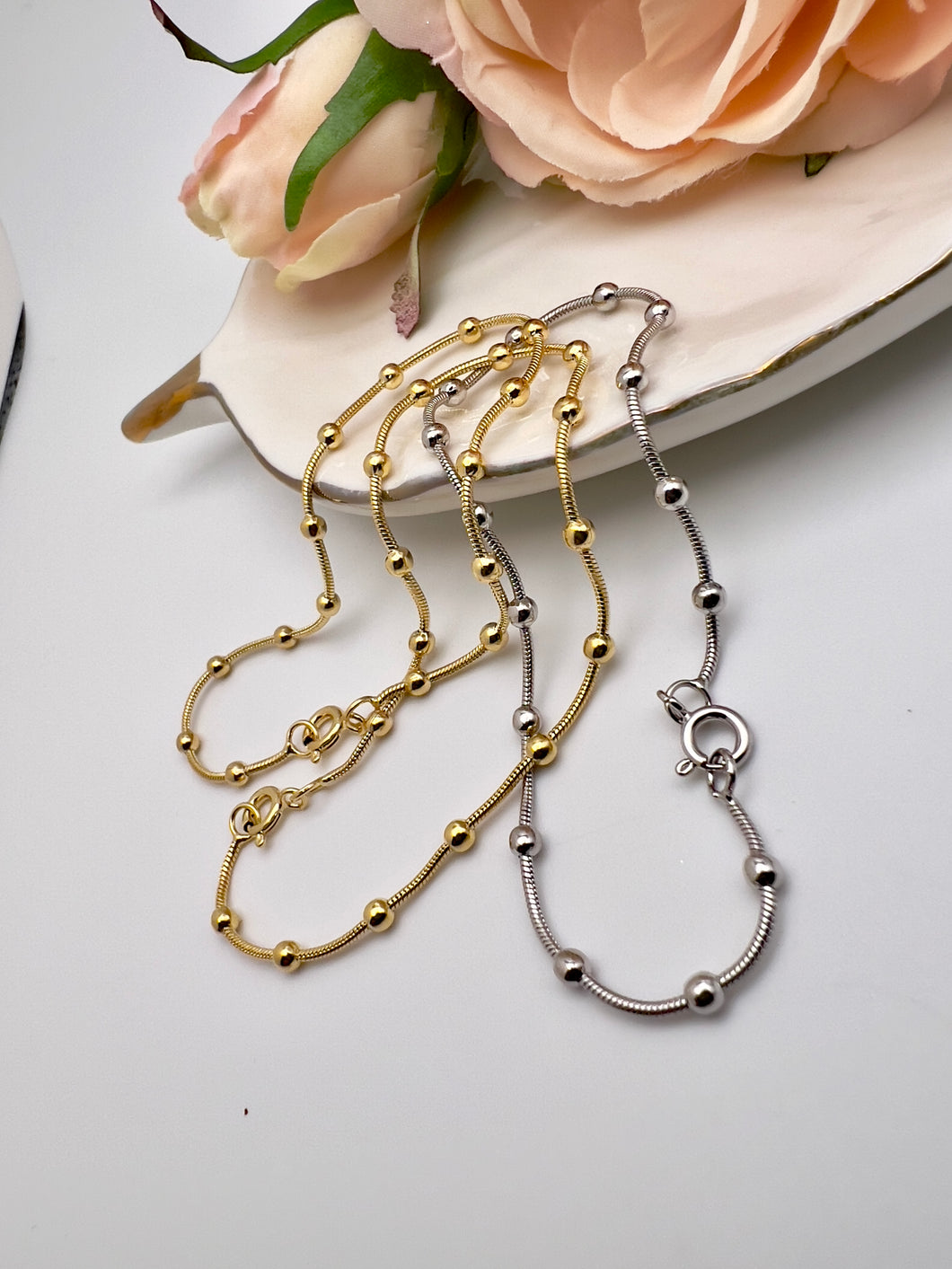 Mouse tail bracelet with small balls like jewelry