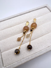 Load image into Gallery viewer, Long Rutilated quartz and eye of tiger earrings
