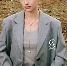 Load image into Gallery viewer, Tie necklace pearl at the end
