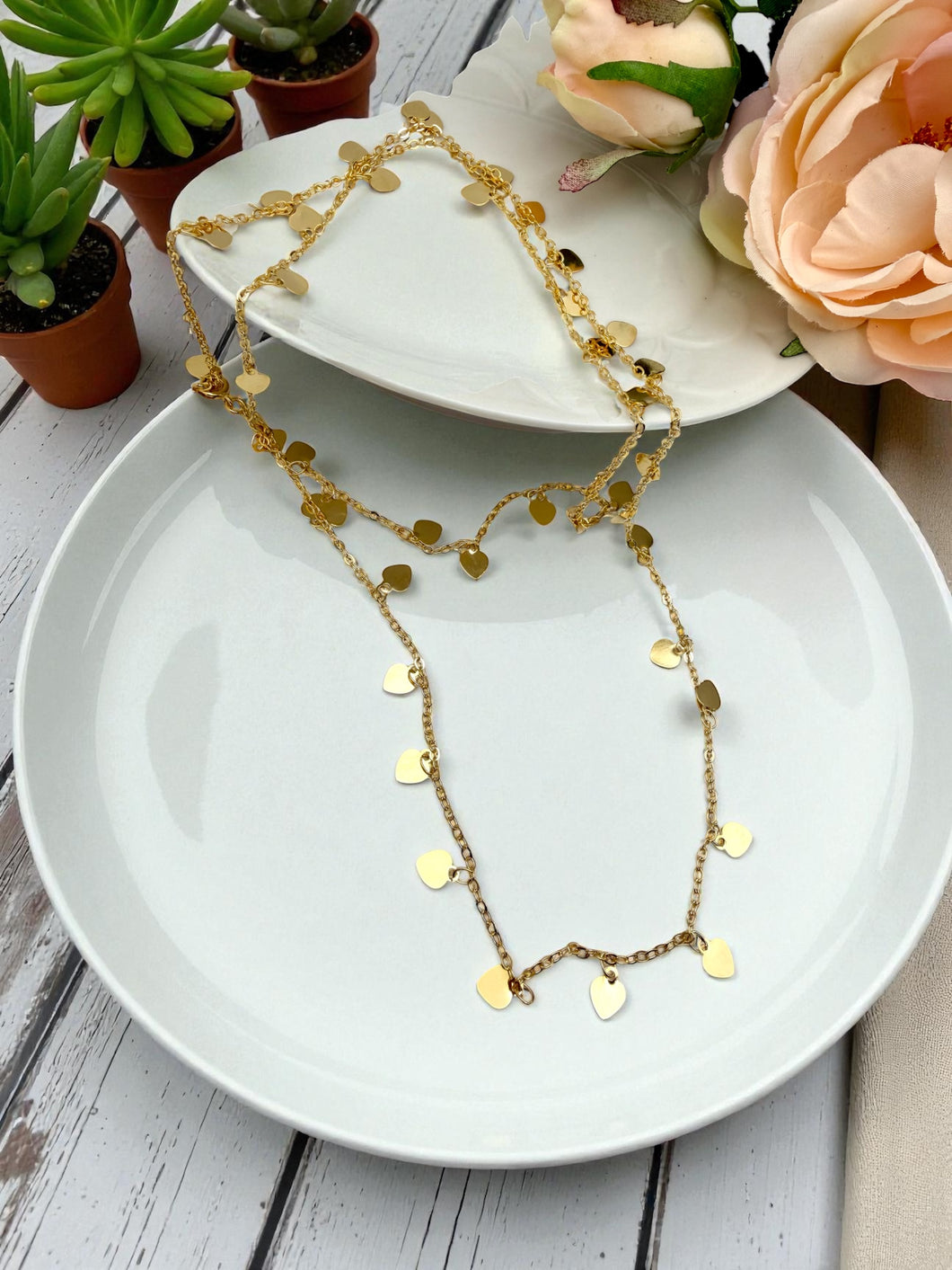 Long necklace with hearts pendant in sequence