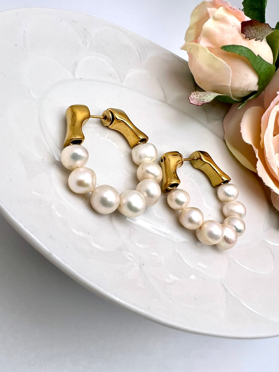 Clip-on hoop earring with freshwater pearls