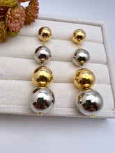 Load image into Gallery viewer, Four different ball sizes gold and rhodium earrings
