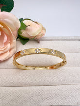 Load image into Gallery viewer, VC wider bracelet with cz clover embedded
