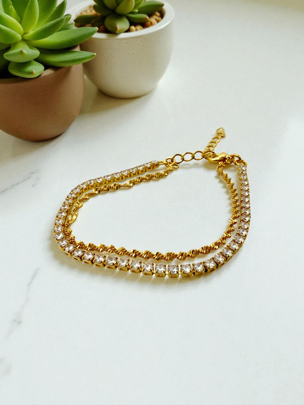 Double tennis bracelet with twisted rope chain