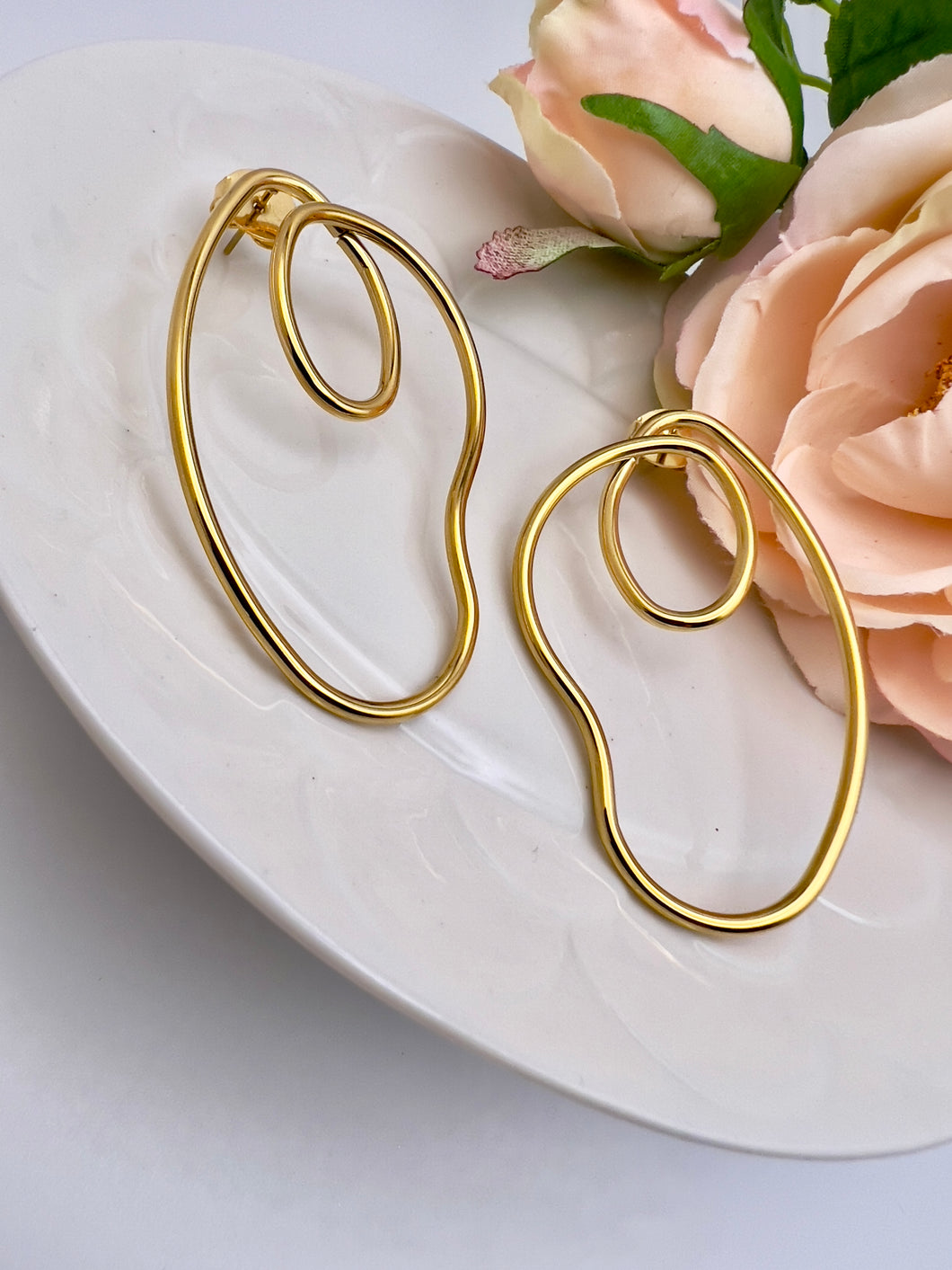Organic knot Seductive Collection earrings