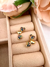 Load image into Gallery viewer, Three small curved heart earrings
