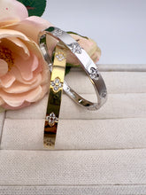 Load image into Gallery viewer, VC wider bracelet with cz clover embedded
