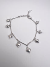 Load image into Gallery viewer, Moving bracelet with heart pendants
