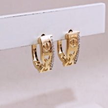 Load image into Gallery viewer, Inspired Carryer nail and buckle detail earrings
