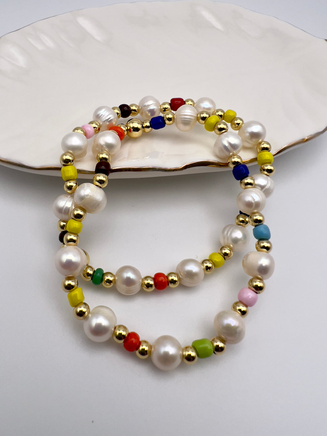 Adjustable pair pearl an colorful beads bracelet