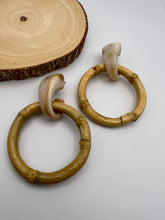 Load image into Gallery viewer, Marbled base and bamboo circle earrings
