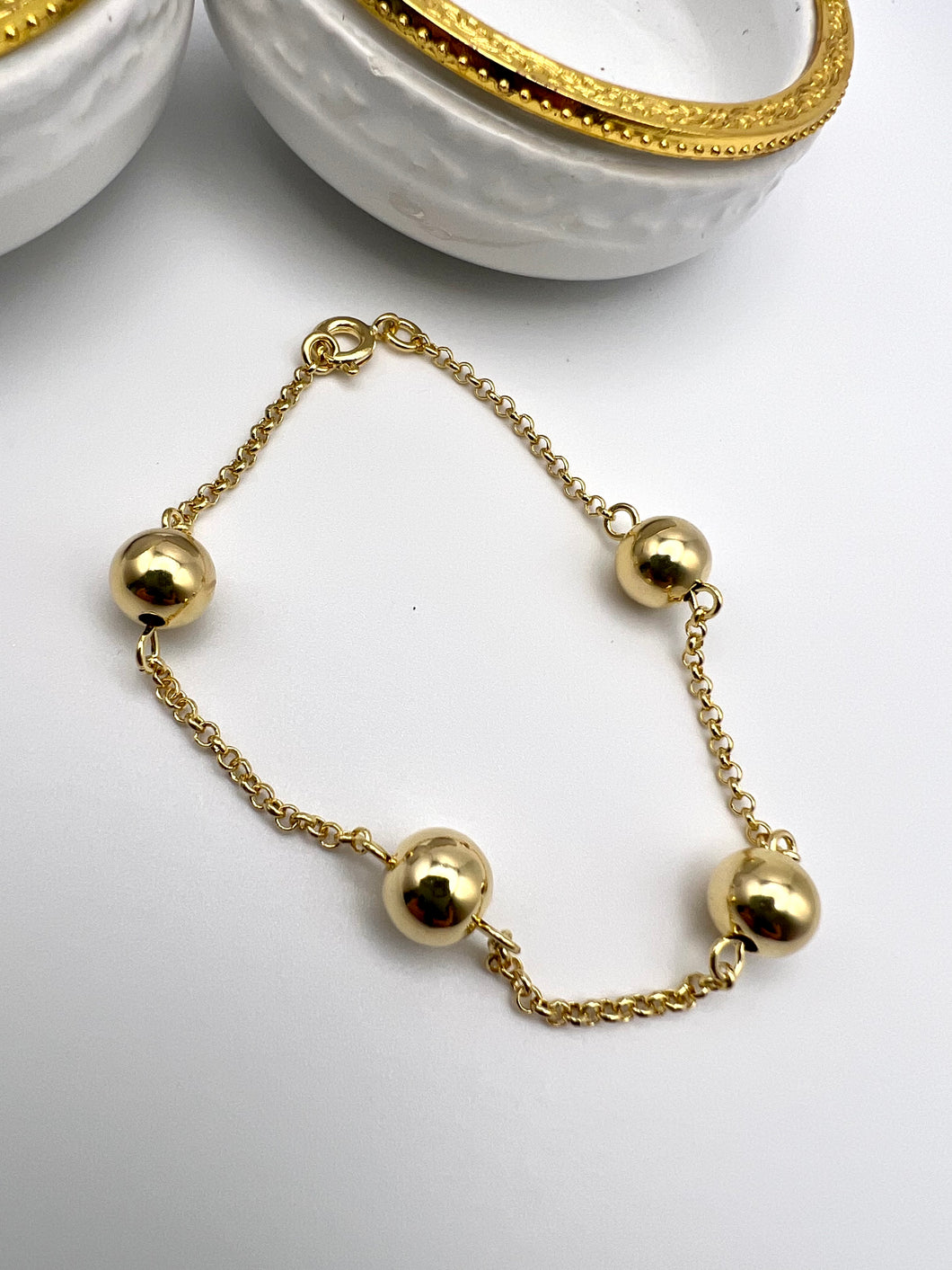 Ball and portuguese link bracelet