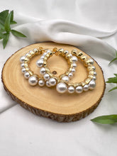 Load image into Gallery viewer, Large hoop with different sizes of pearl earrings
