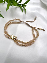 Load image into Gallery viewer, Adjustable 2 crystal rows golden heart detail bracelet
