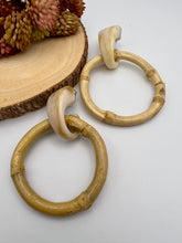 Load image into Gallery viewer, Marbled base and bamboo circle earrings
