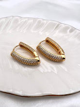 Load image into Gallery viewer, Elongated clip cz zirconia hoop earrings
