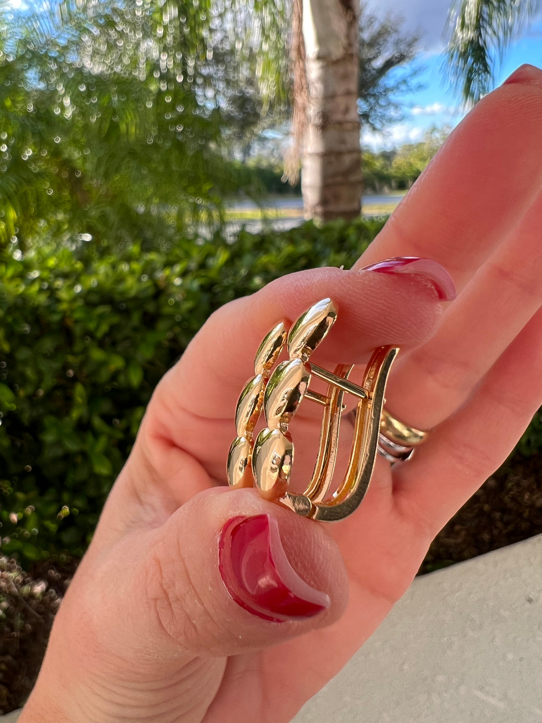 Three golden hearts earrings