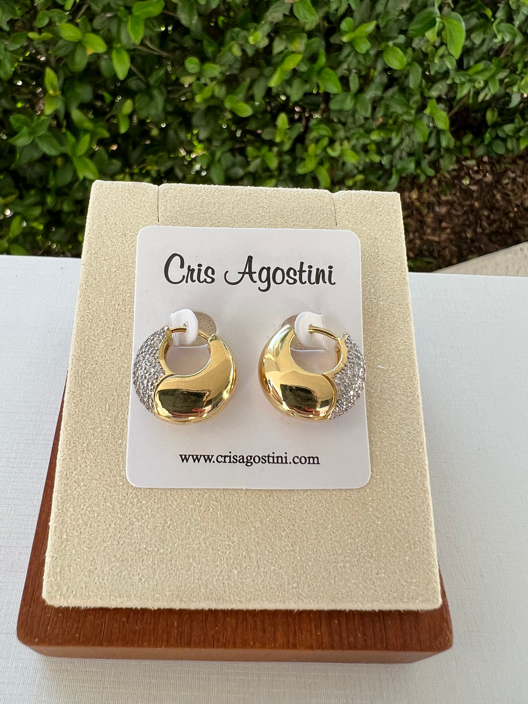 Bulging hoop earring studded in the front