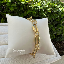 Load image into Gallery viewer, Gold plated cowrie shell bracelet
