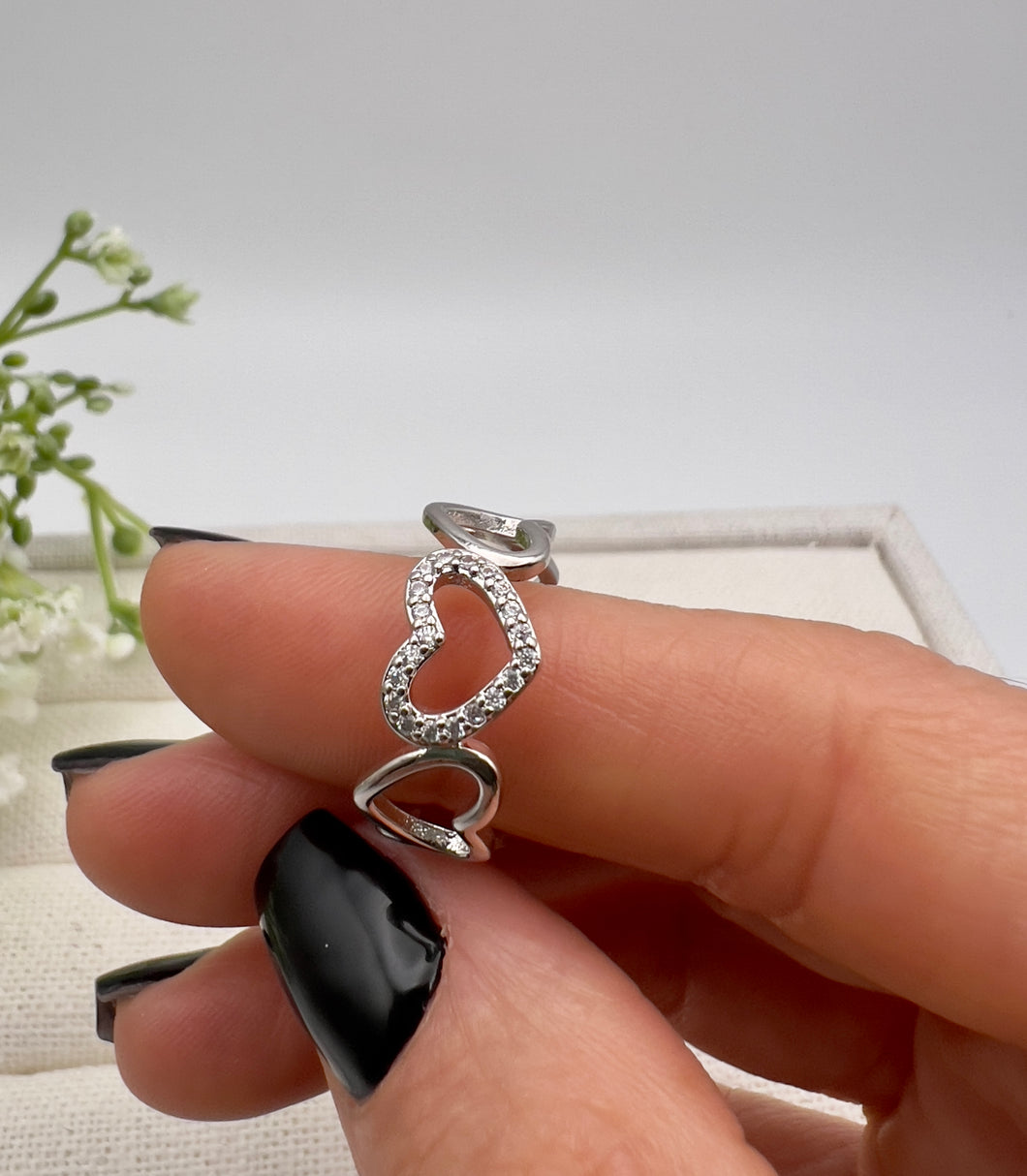 Hearts holding hands cz details ring