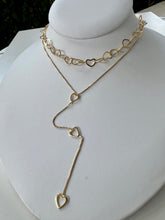 Load image into Gallery viewer, Thin golden necklace with pendant hearts
