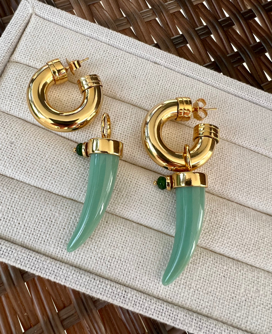 Chubby hoop with saber tooth pendant earrings